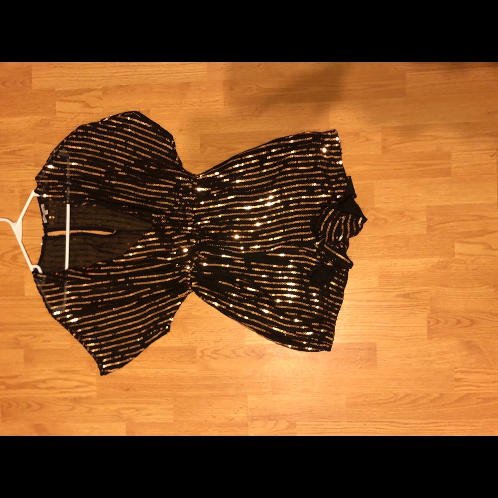 Shiny black and gold romper